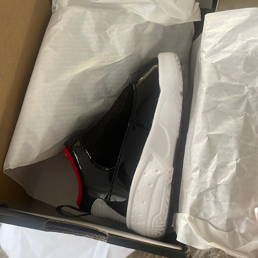 Infant size 4 Black and light gray Jordans